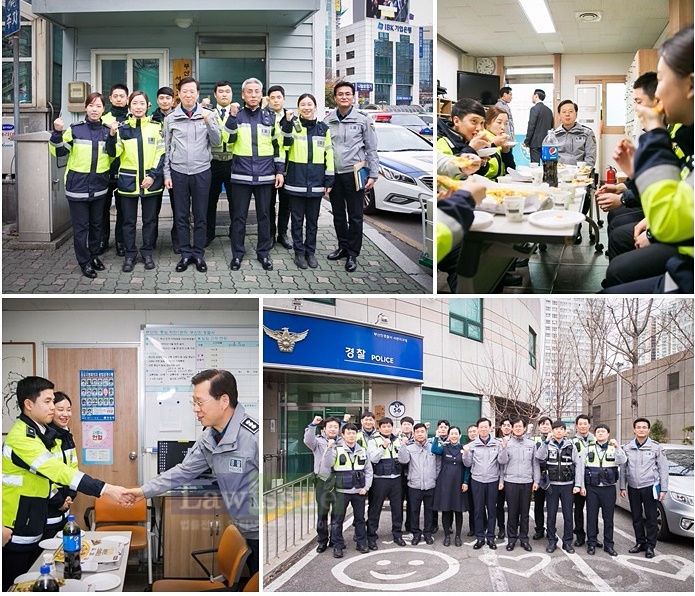 조현배 부산경찰청장이 피자를 들고서면지구대 및 서면교통초소를 방문해 격려하고 기념촬영.(사진=부산지방경찰청)
