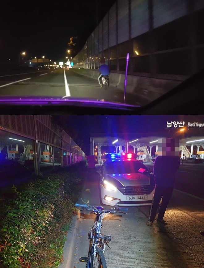 고속도로 갓길로 음주상태서 자전거를 운전하고 있다. (사진제공=부산지방경찰청)