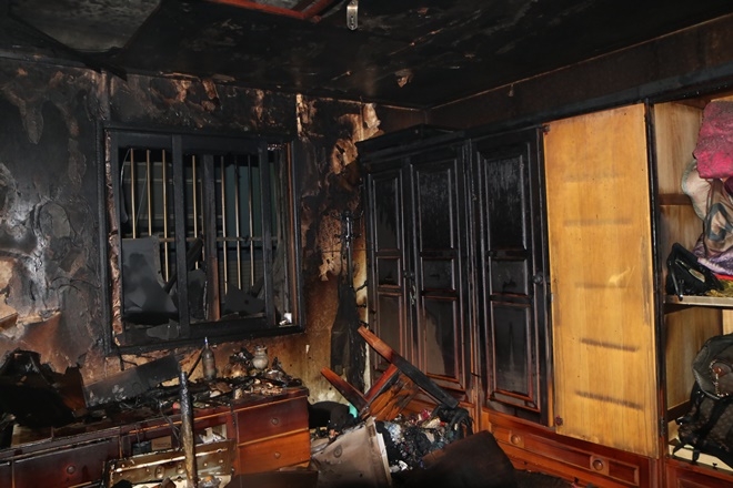 주택 2층 주거지가 소훼돼 소방서추산 500만원 상당 재산피해가 난 현장.(사진제공=부산지방경찰청)