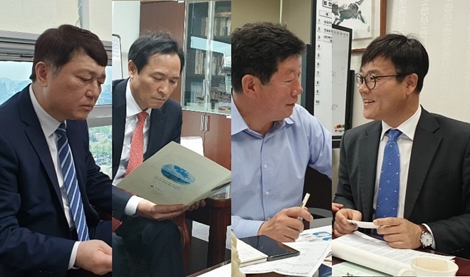 변광용 거제시장(사진우측)이 최재성·우상우·박재호 의원을 만나 협조를 구하고 있다.(사진제공=거제시)