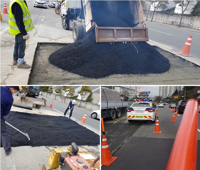 도로침하 복구작업을 하고 있다.(사진제공=부산경찰청)