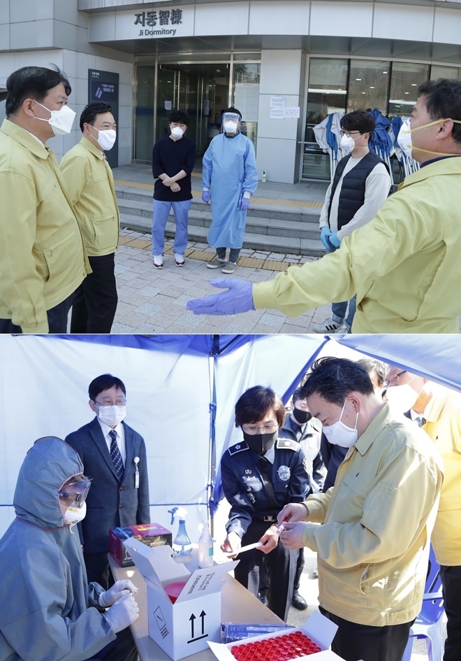 (사진위)1. 김오수 법무부 차관(왼쪽 두 번째)이 31일 충북 진천 소재 법무연수원을 방문해 법무연수원 생활관에 근무하는 정부합동지원단 직원을 격려하고 있다. (아래) 1. 김오수 법무부 차관(오른쪽)이 31일 경기도 화성 소재 화성직업훈련교도소 선별진료소에서 코로나 진단키트를 살펴보고 있다. (사진제공=법무부)