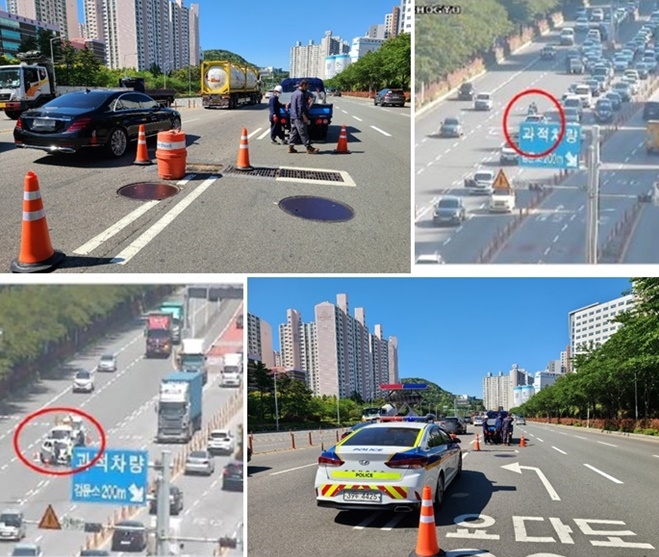 맨홀뚜껑 침하에 트레일러 차량고장으로 교통정체 발생.(사진제공=부산시 교통정보센터 , 부산경찰청)