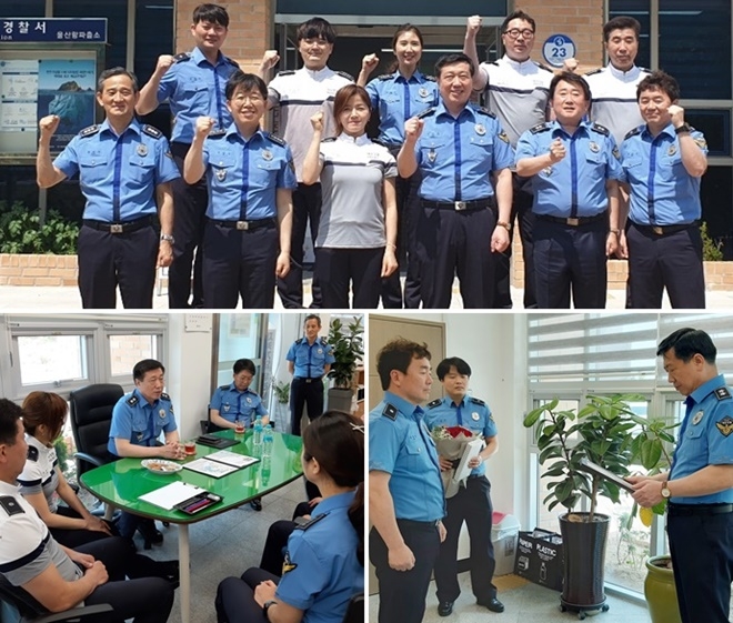 구자영 남해해경청장이 울산항VTS에 이어 울산항 파출소를 방문해 화재선박 인명구조 유창섭 경위에게 표창을 수여하고 직원들과 대화를 나누고 있다.(사진제공=남해지방해양경찰청)