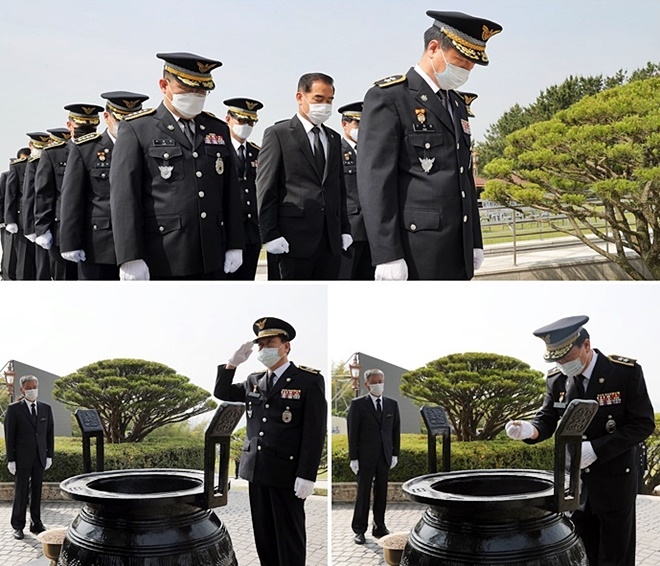 구자영 남해해경청장 등 지휘부들이 6월 5일 부산 중구 중앙공원 충혼탑을 찾아 참배하고 있다.(사진제공=남해지방해양경찰청)