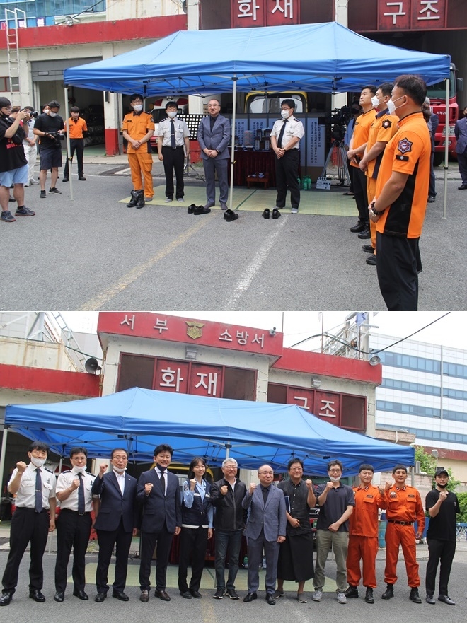6일 울산 중구 성남119안전센터에서 영화 소방관 안전기원제를 열고 기념촬영.(사진제공=울산소방본부)