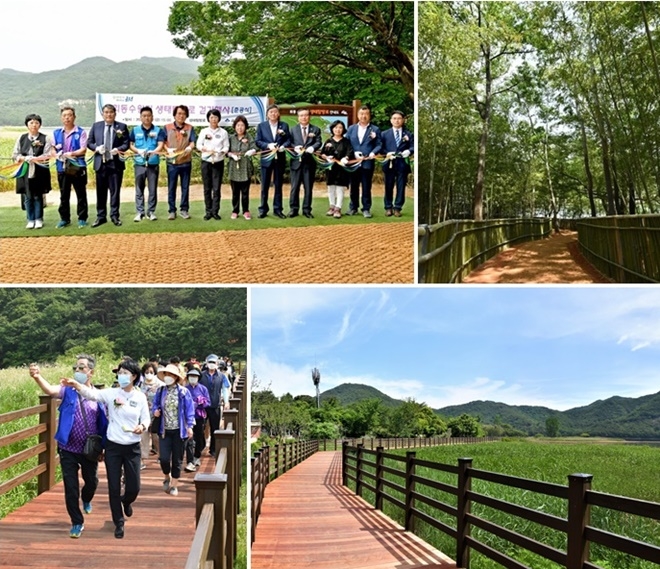 정미영 구청장이 회동수원지 생태탐방로 준공식을 갖고 구민들과 걷고 있다.(사진제공=부산 금정구)