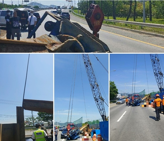 23일 명지IC부근서 크레인 작업중 와이어줄이 절단되면서 크레인 뭉치가 낙하 사망현장.(사진제공=부산경찰청)