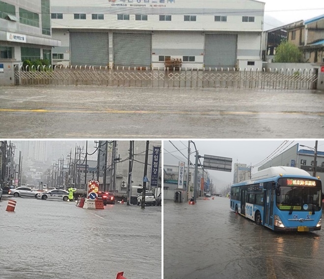 부산에 내린 호우로 도로가 침수되고 교통통제.(사진제공=부산경찰청)