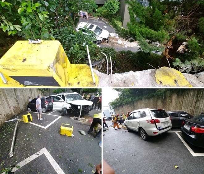 부산 사하구 장림동 한 아파트 주자장서 급발진 추정 차량 추락사고현장.(사진제공=부산경찰청)