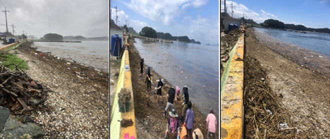 수해피해지역인 우도 바닷가 현장에서 국민공모제 사회봉사를 하고 있다.(사진제공=창원준법지원센터)