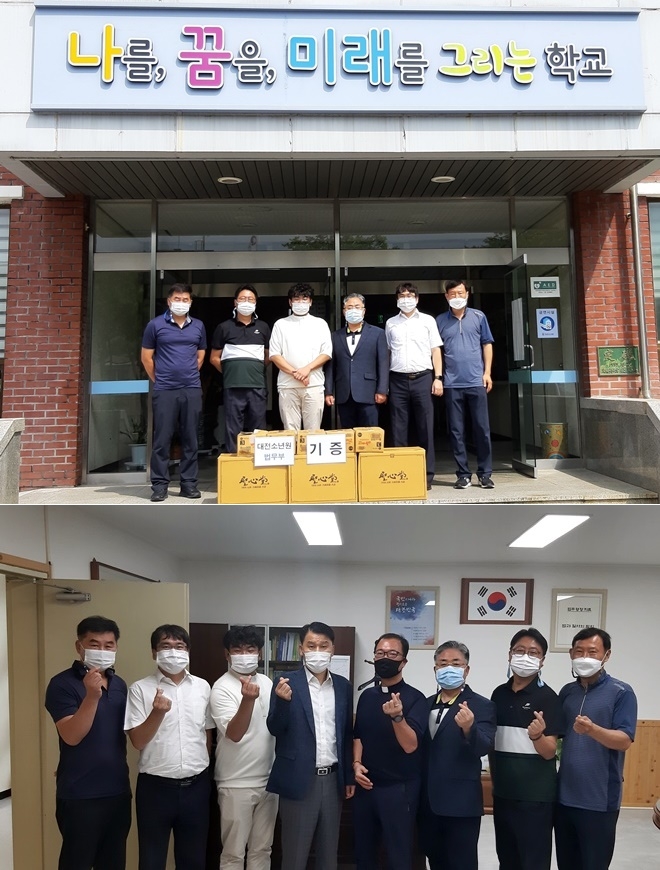 천주교 대전교구 교정사목부가 14일 대전소년원을 방문에 간식을 기증하고 업무협의를 갖고 기념촬영. (사진제공=대전소년원)