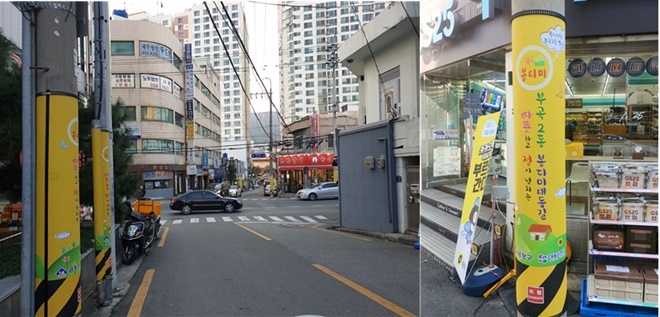 부곡2동 마을문제해결단이 불법광고물부착 방지판 설치로 봉디미마을 알리기에 나서고 있다.(사진제공=부산금정구)