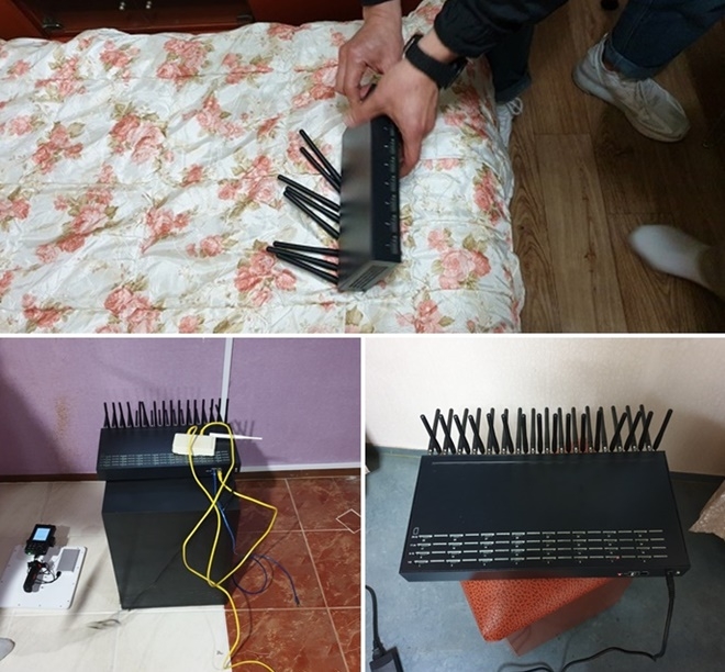 경찰이 전화번호 변작 중계기를 압수하고 있다. (사진제공=부산경찰청)