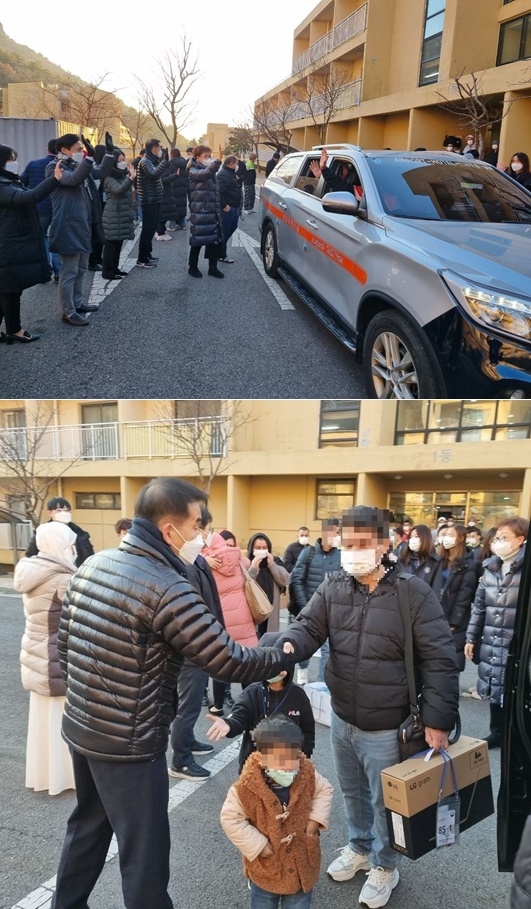 아프간 특별기여자들이 여수 임시생활시설을 떠나며 작별인사를 하고 있다.(사진제공=법무부)