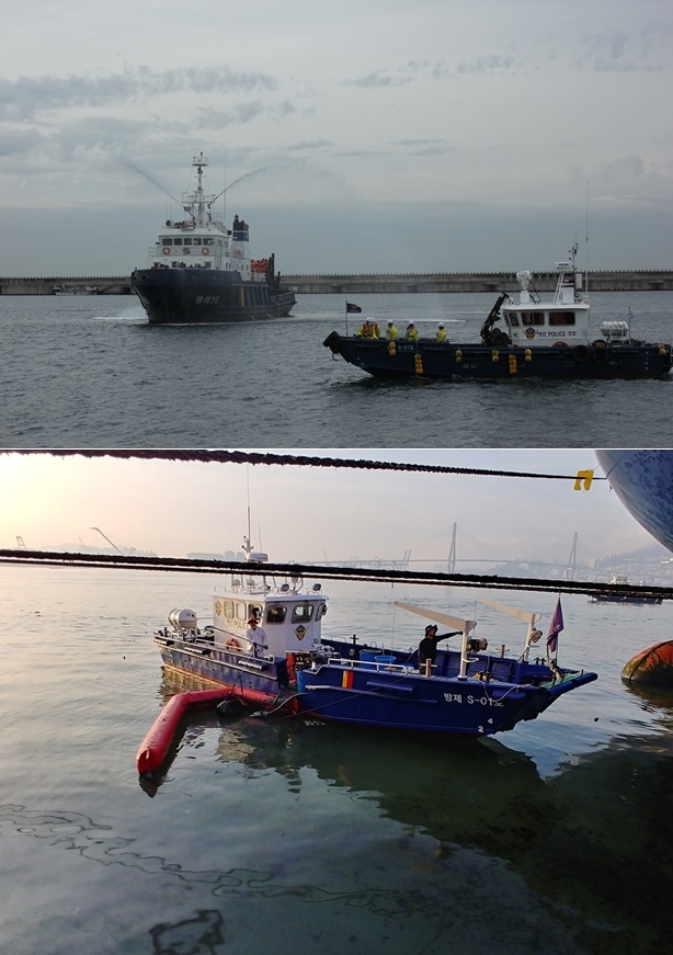 해양오염방제작업중인 울산해경과 부산해경.(사진제공=남해지방해양경찰청)