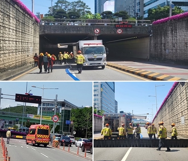 교통통제 및 차단, 유입수 차단, 인명구조 및 유입수 배출 훈련을 하고 있다.(사진제공=부산소방재난본부)