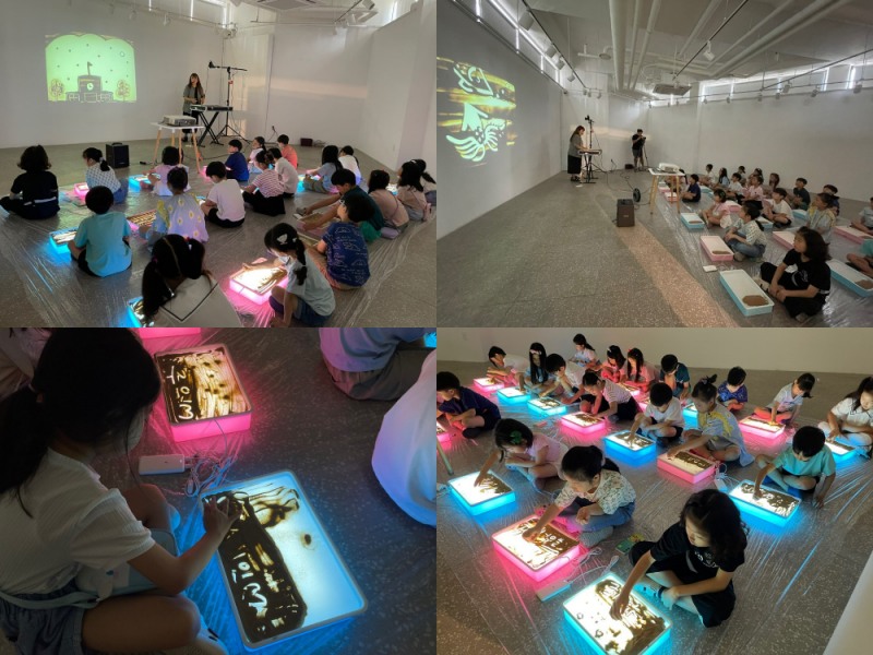 아이비 라운지 갤러리에서 어린이들이 샌드아트 수업에 열중하고 있다.(사진=반도문화재단)