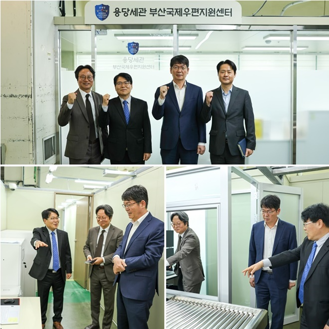 (위사진)유영한 부산본부세관장(왼쪽에서 세번째)이 14일 오전 용당세관 국제우편지원센터에서 직원들과 기념활영을 하고 있다.(사진제공=부산본부세관)