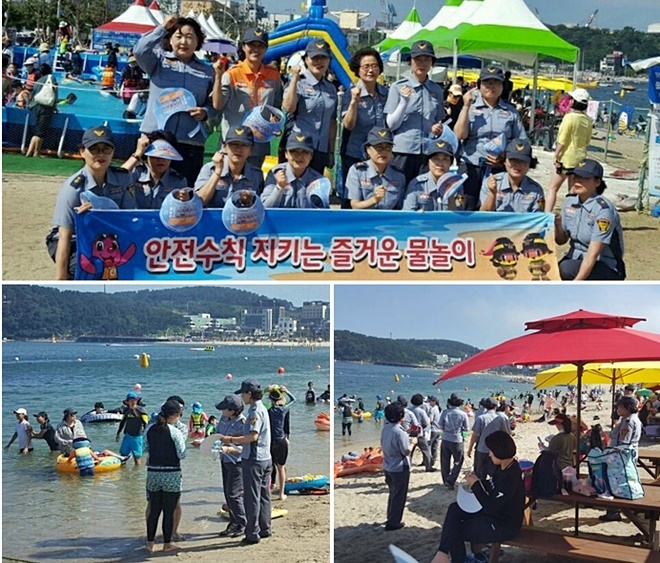 화정지역의용소방대가 일산지해수욕장에서 물놀이안전 홍보캠페인을 전개하고 있다.(사진제공=울산동부소방서)