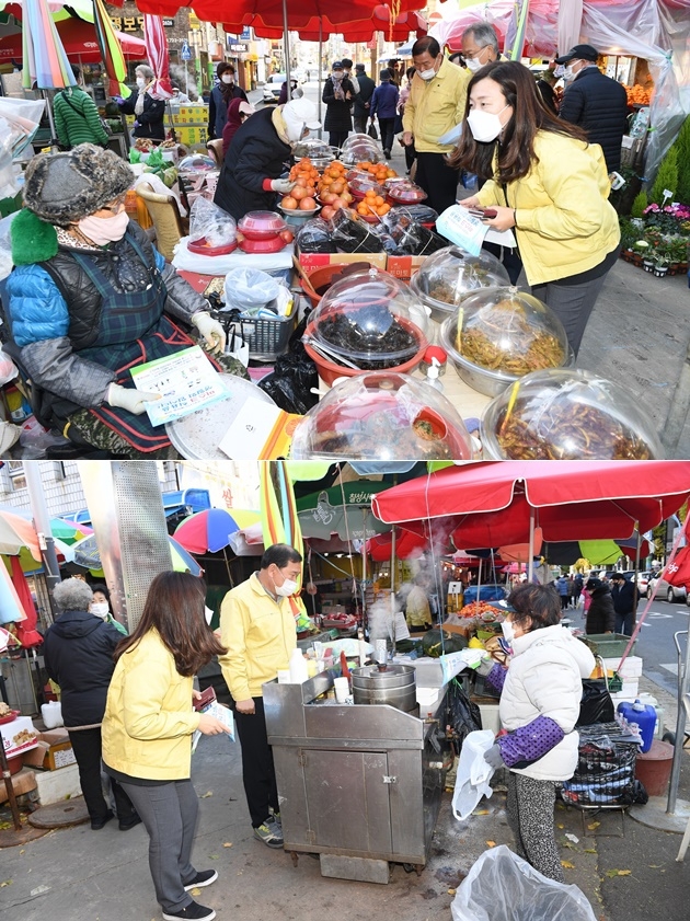 11월 30일 오전 11시경 기장군 직원들이 기장읍 기장시장 주변 난전상, 노점상 상인들에게 손소독제와 코로나19방역수칙 안내문을 나눠주고 마스크착용, 손소독제 사용 등 방역수칙을 준수해 줄 것을 요청하고 있다. (사진제공=부산 기장군)