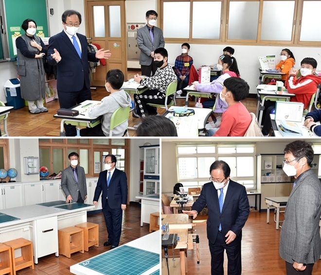 김석준 부산교육감이 16일 초등학교 신학기 학사운영 상황을 점검하고 학생들과 담소를 나누고 있다.(사진제공=부산시교육청)