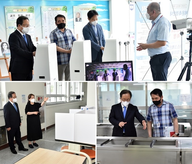 김석준 부산교육감이 고등학교 전면등교 첫날인 28일 동래 용인고와 학산여중을 방문해 학사일정과 방역상황을 점검하고 있다.(사진제공=부산교육청)