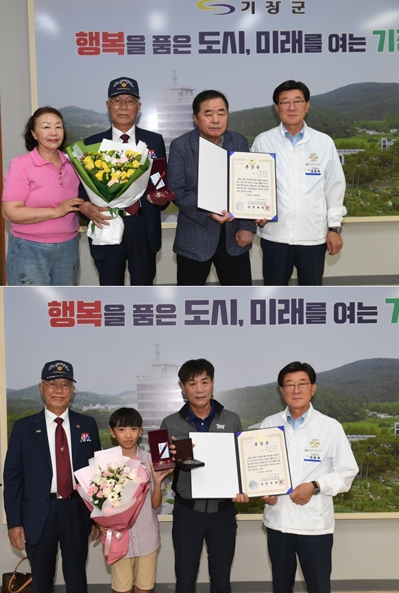 (사진위부터)정종복 부산 기장군수가 6월 27일 6·25전쟁에 참전해 혁혁한 공을 세운 故허상출 님의 조카 허정태 씨와 故 조용길님의 자녀 조택상 씨에게 화랑무공훈장과 훈장증을 전수하고 기념촬영.(사진제공=부산 기장군)