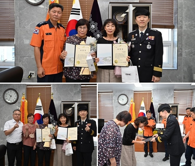 류승훈 서장이 인명대피 및 초기진압에 큰 공을 세운 요양병원 직원들에게 표창을 수여하고 기념촬영.(사진제공=부산소방재난본부)