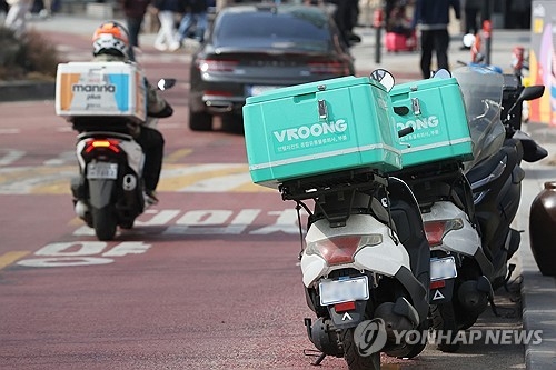 오토바이 배달 기사 모습,(사진=연합뉴스)