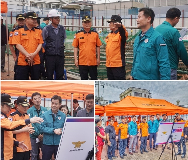 남화영 소방청장(위사진 왼족 세번째)이 울산 태화시장을 방문해 태화시장 침수 대비·대응 대책보고를 받고 있다. (사진제공=울산소방본부)