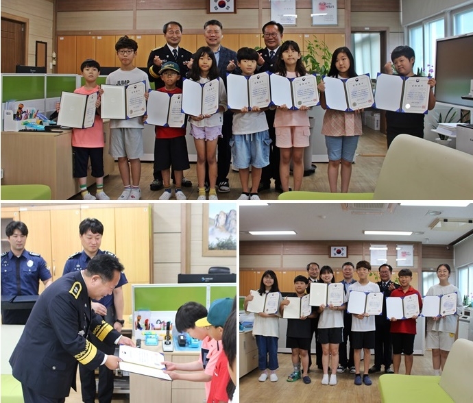 최진규 소장이 진보초등학교를 방문해 교정장학 증서를 전달하고 기념촬영.(사진제공=경북북부제1교도소)