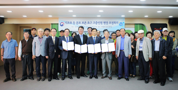현장조정회의 후 기념 촬영(사진=권익위)