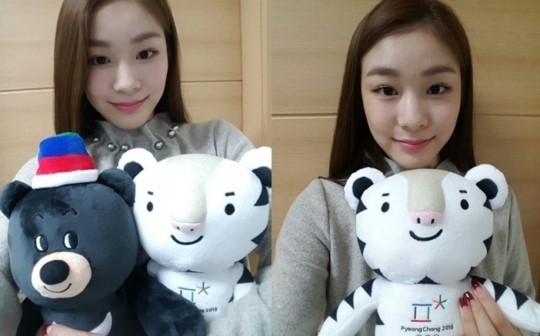 김연아, '짙은 눈화장...단아하게 내린 헤어+고혹적 미소'