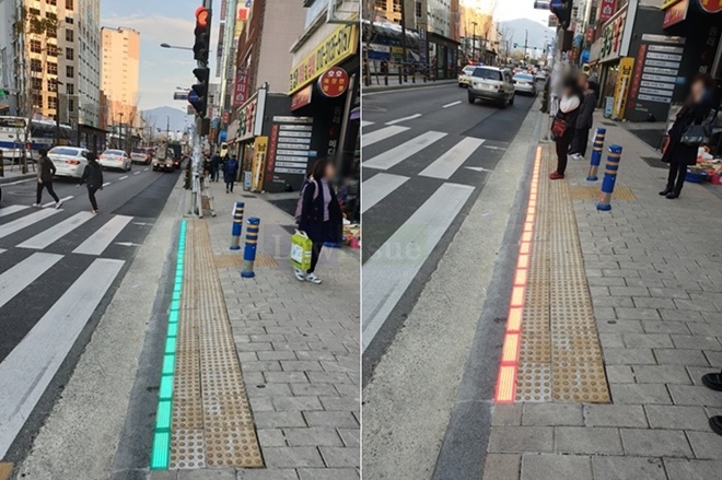 바닥신호등 설치로 스마폰을 보다가도 신호를 알 수 있다.(사진제공=부산지방경찰청)