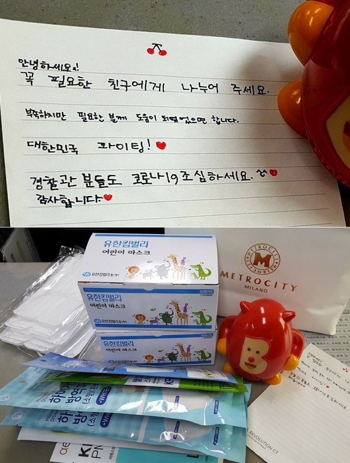 초등학생 기부천사가 팔송파출소에 놓고간 손편지, 마스크, 원숭이 저금통.(사진제공=부산경찰청)