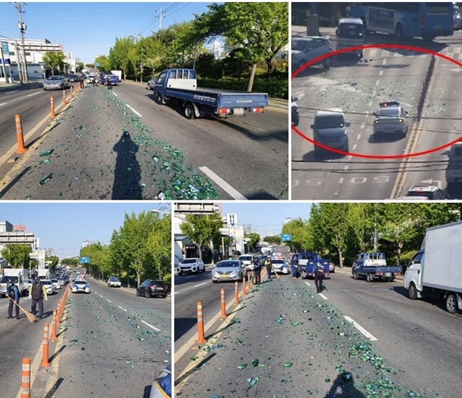 빈 소주병 2박스 낙하 현장.(사진제공=부산경찰청, 부산시교통 관제센터)