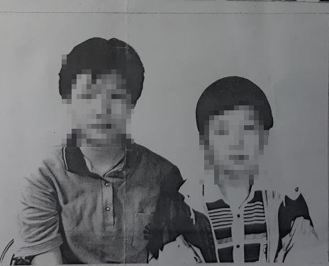 일본에 거주하는 아버지가 편지와 함께 보낸 남매의 빛바랜 사진.(사진제공=부산경찰청)