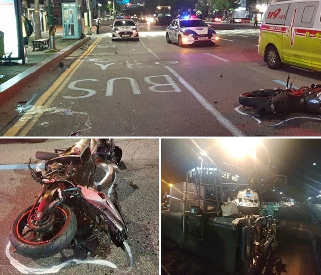 8일 0시 45분경 부산진구 개금동 새마을금고 본점 앞에서 세워둔 건설기계(아스팔트피니셔)와 충돌해 발생한 오토바이 교통사망사고현장.(사진제공=부산경찰청)