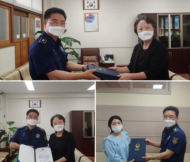 엄궁중학교와 동주중학교 재학생 10명에게 장학금과 장학증서를 전달하고 기념촬영.(사진제공=부산구치소)