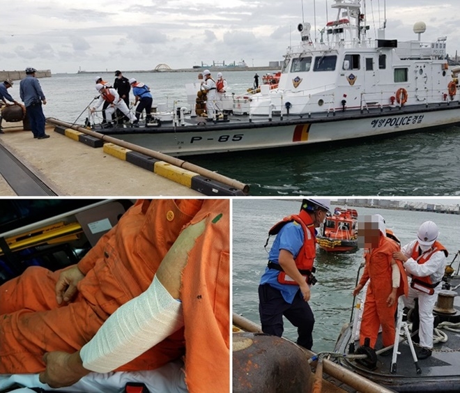 23일 울산신항컨테이너 터미널 계류 선박 내 부상자를 이송 하고 있다. (사진제공=울산소방본부)