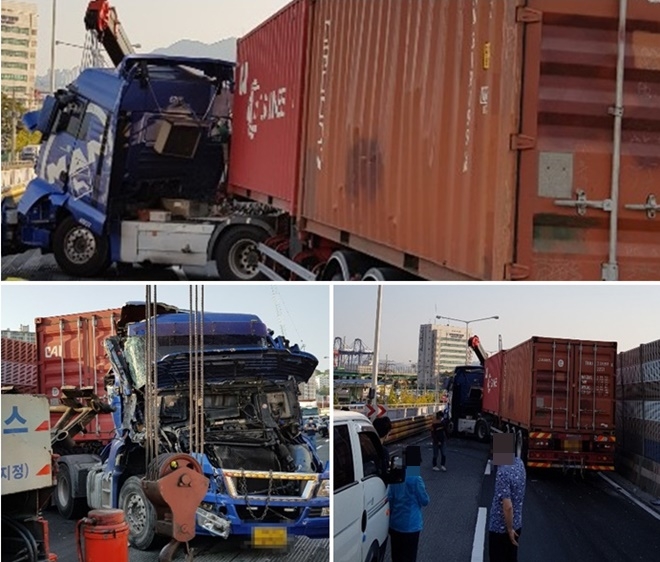 12일 오후 수정터널 지나 5부두방면서 트레일러차량 헤드 꺾여 정차.(사진제공=부산경찰청)