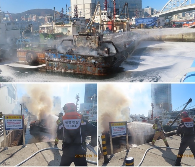 11월 9일 오후 2시 발생한 영도 계류선박 화재를 진화하고 있다.(사진제공=부산해양경찰서)