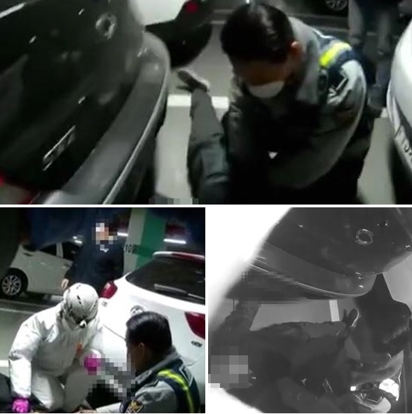 아파트 지하주차장에 쓰러진 시민을 심폐소생술로 구조하고 있는 김상묵 경위.(사진제공=부산경찰청)