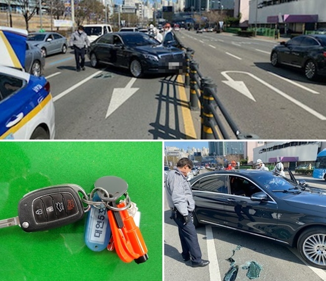 대연지구대 안재홍 경위 등이 지병으로 의식을 잃은 차량운전자를 차량유리 파쇄용 망치로 깨고 운전자를 구조해 119로 병원이송(사진제공=부산경찰청)