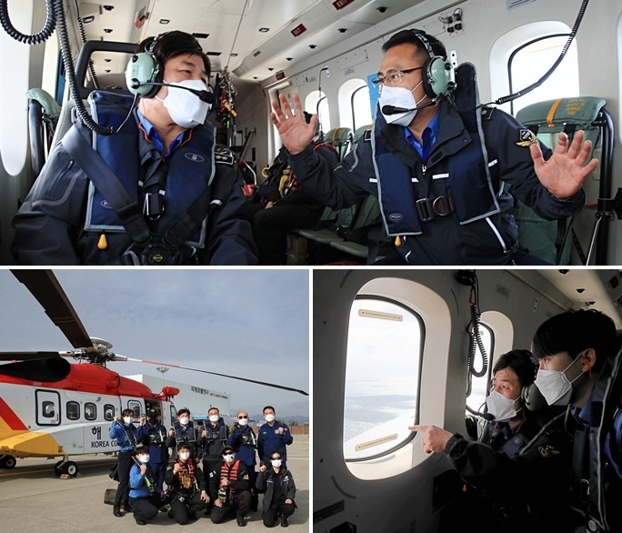 남해해경청 종합상황실 근무자들이 합동 항공순찰을 실시하며 항공임무에 대한 설명을 듣고 있다.(왼쪽 남해해경청 오태옥 상황실장, 오른쪽 장영철 항공단장). (사진제공=남해지방해양경찰청)