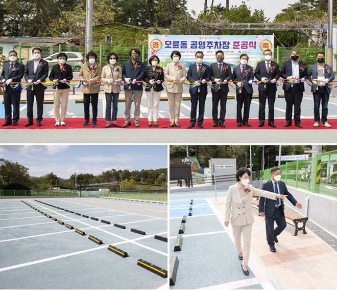정미영 구청장이 오륜동 공영주차장 준공식에 참석하고 주차장을 둘러보고 있다.(사진제공=부산 금정구)