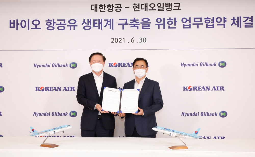 강달호 현대오일뱅크 사장(오른쪽)과 우기홍 대한항공 사장(왼쪽).(사진=현대오일뱅크)