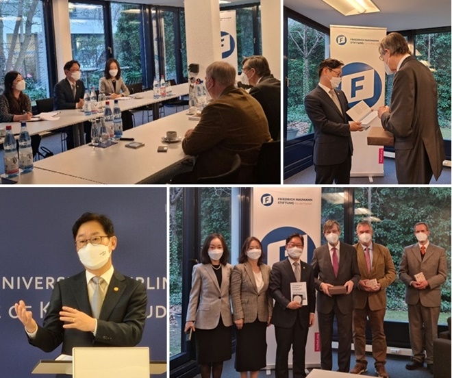 박범계 법무부장관이 나우만재단 칼-하인츠 파케 이사장 등 관계자들과 통일법제 준비에 관한 간담회를 갖고 있다./박범계 법무부장관이 칼-하인츠 파케 이사장의 저서를 소개받고 있다./박범계 법무부장관이 칼-하인츠 파케 이사장 등 간담회 참석자들과 기념사진을 찍고 있다./박범계 법무부장관이 베를린 자유대학에서 법무부의 스타트업 창업 법적 지원 정책에 대한 강연을 하고 있다(사진제공=법무부)