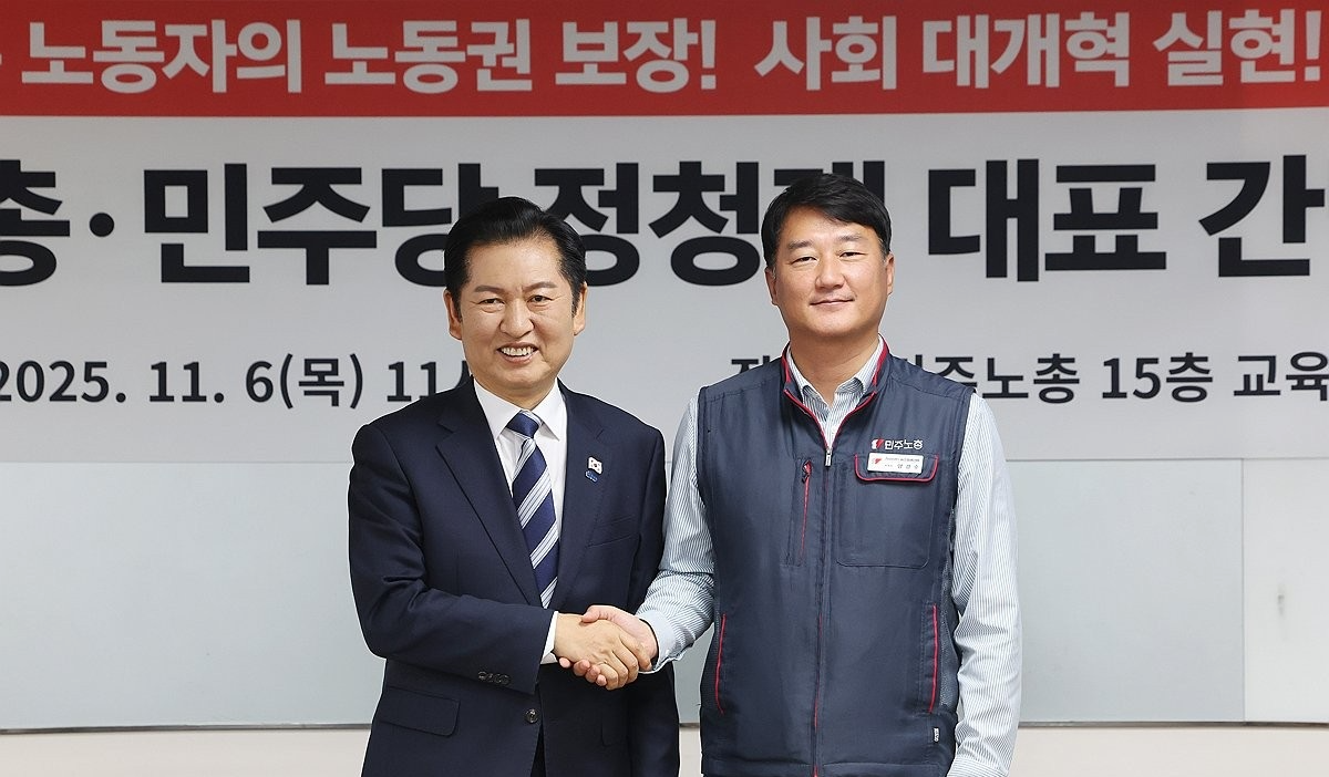 더불어민주당 정청래 대표와 양경수 민주노총 위원장(사진=연합뉴스)